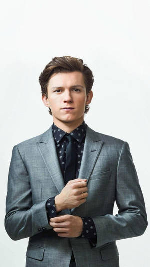 Tom Holland In Gray Suit Wallpaper