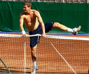 Tomas Berdych Masterful Mid-game Net-crossing Moment Wallpaper