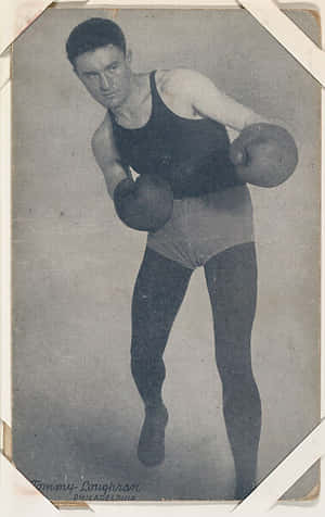 Tommy Loughran In Punching Pose Wallpaper