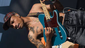 Topless Steve Lacy Playing Guitar Wallpaper