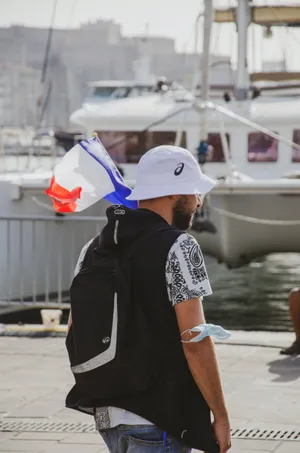 Tourist With Flag In France Iphone Wallpaper