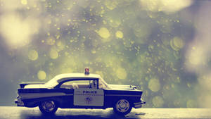 Toy Police Car Wallpaper
