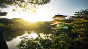 Traditional Japanese Mountain Scenes Across A Desktop Wallpaper