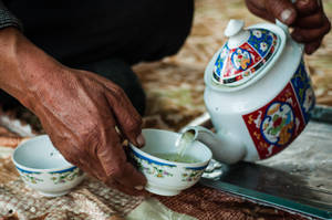 Traditional Tea Serving In Tajikistan Wallpaper