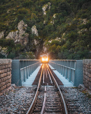 Train Crossing A Bridge Wallpaper
