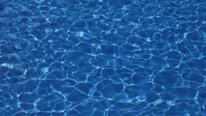 Tranquil Depths Of A Sparkling Pool Wallpaper