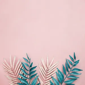 Tropical Leaves On Pastel Pink Background Wallpaper