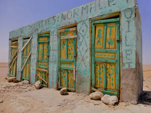 Tunisia Concrete Horses Barn Wallpaper