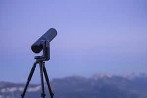 Twilight Telescope Overlooking Mountains Wallpaper