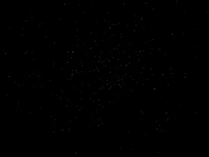 Twinkling Stars On Blank Black Sky Wallpaper