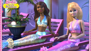 Two Barbie Mermaids Sunbathing Wallpaper