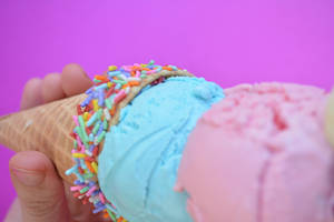 Two Colorful Scoops Of Ice Cream Wallpaper