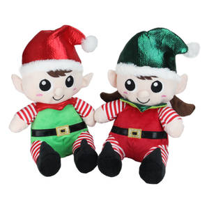 Two Elf Stuffed Toys Sitting Next To Each Other Wallpaper