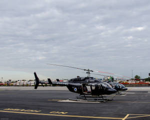 Two Helicopters Parked Wallpaper