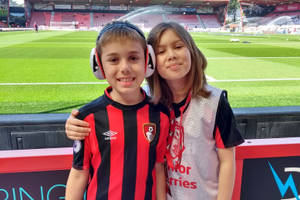 Two Kids Supporting Afc Bournemouth Wallpaper