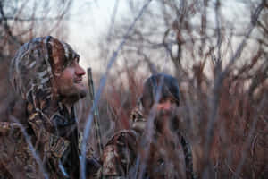 Two Men Eyeing Before Hunting Desktop Wallpaper