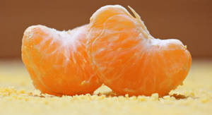 Two Peeled Zest Clementine Citrus Fruits Wallpaper