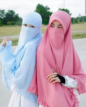 Two Women Wearing Cadar Wallpaper