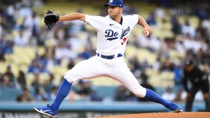 Tyler Anderson In Wide Throwing Stance Wallpaper