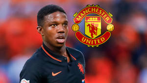 Tyrell Malacia Manchester United Logo Wallpaper