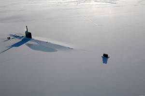 U S Navy Submarine Breaking Through Ice Wallpaper