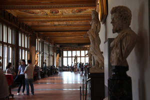 Uffizi Gallery Corridor With Tourists Wallpaper