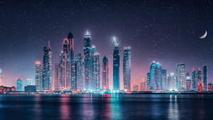 Ultra Hd Dubai Skyline Under Stars Laptop Wallpaper