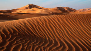 Ultra Hd Sand Dune With Waves Laptop Wallpaper