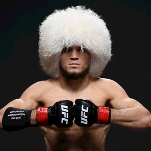 Umar Nurmagomedov Posing While Wearing Papakha Wallpaper