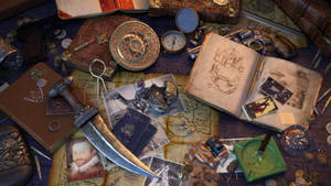Uncharted Game Books And Artefacts Wallpaper