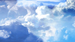 Unending Blue Sky Filled With Beautiful Heavenly Clouds Wallpaper