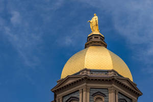 University Of Notre Dame Dome Under Blue Sky Wallpaper