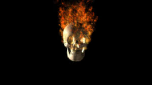 Unleash Your Inner Fire With The Flaming Skull Wallpaper