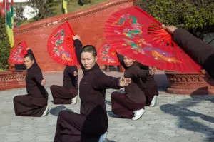 Unleashing Strength And Fearlessness: Kung Fu Nuns In Kathmandu, Nepal Wallpaper