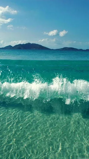 Unplug From Your Daily Routine And Relax At The Beach With Your Phone Wallpaper