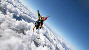 Upside Down Falling Above Clouds Skydiving Wallpaper