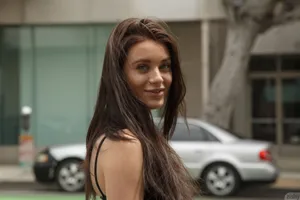 Urban_ Glance_ Smiling_ Woman Wallpaper