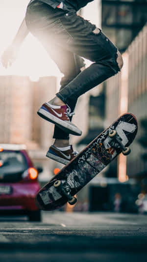 Urban Skateboard Trick Action.jpg Wallpaper