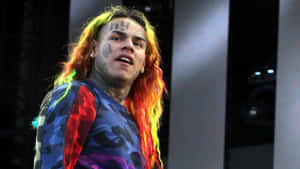 Us Rapper 69 In His Signature Style Wallpaper