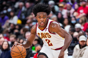 Utah Jazz Basketball Collin Sexton Running Position Wallpaper