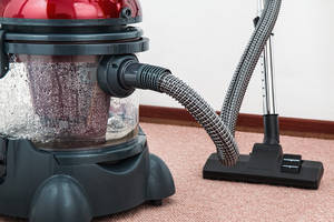 Vacuum Cleaner On The Floor House Cleaning Wallpaper