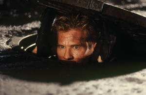 Val Kilmer Suspense Action Film Wallpaper