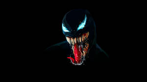 Venom Movie With Glowing Blue Eyes Wallpaper