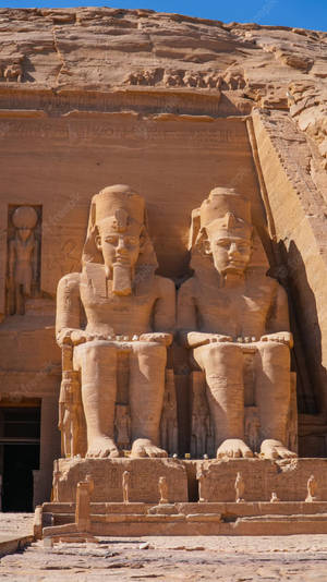 Vertical Photo Of Abu Simbel Temple's Statues Wallpaper