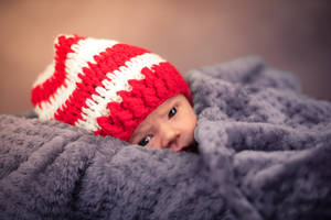 Very Cute Baby In Cotton Blanket Wallpaper