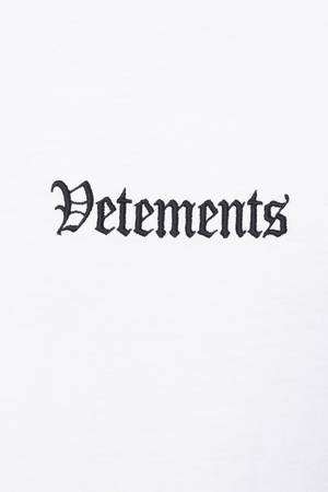 Vetements Embroidered On White Wallpaper