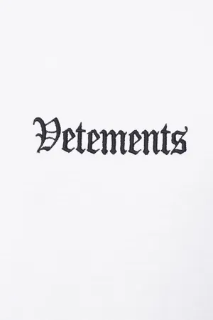 Vetements Embroidered On White Wallpaper