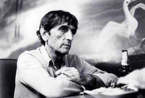 Veteran Actor Harry Dean Stanton In A Still From A Classic Film Wallpaper