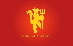 Vibrant And Iconic Manchester United Logo On A Dark Background Wallpaper