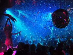 Vibrant Nightclub Life Wallpaper